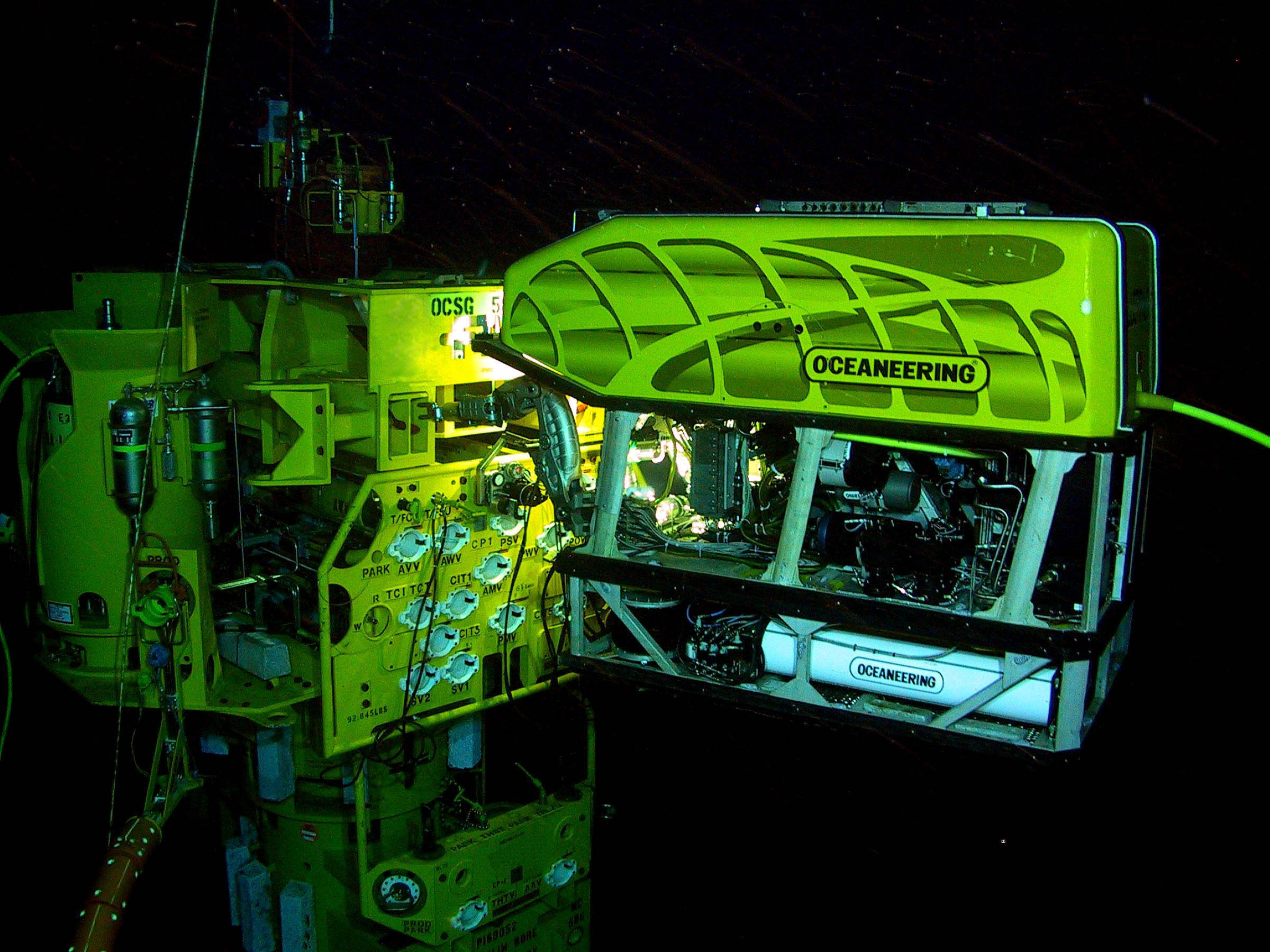 Work-class remotely operated vehicle carrying out a subsea inspection